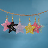 Large stars within stars earrings