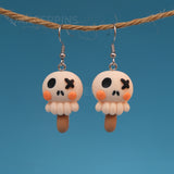 Spooky Skulls on Sticks earrings