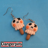 Spooky Skulls on Sticks earrings