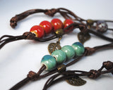 Set of 5 glazed ceramic bracelets with leaf charm