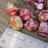 Rasberry Mango Swirl swirl RPG dice earrings