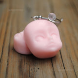 Creepy baby heads earrings