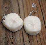 Creepy baby heads earrings