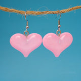 Wide sparkle hearts earrings