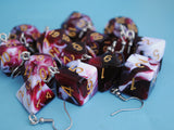 Vermilion Snow Swirl swirl RPG dice earrings