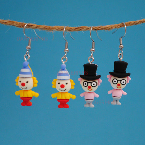 Weird little circus guys with fancy hats earrings