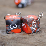 Tangerine Storm Swirl swirl RPG dice earrings