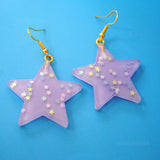 Large stars within stars earrings