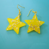 Large stars within stars earrings