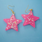 Large stars within stars earrings