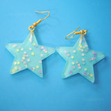 Large stars within stars earrings