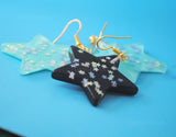 Large stars within stars earrings