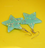 Large stars within stars earrings