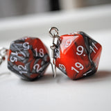 Tangerine Storm Swirl swirl RPG dice earrings