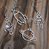 4 Space themed metal earrings