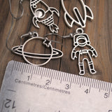 4 Space themed metal earrings