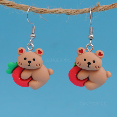 Clingy but cute strawberry bear earrings