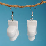 Stinky gross toilet earrings for weirdos