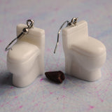 Stinky gross toilet earrings for weirdos